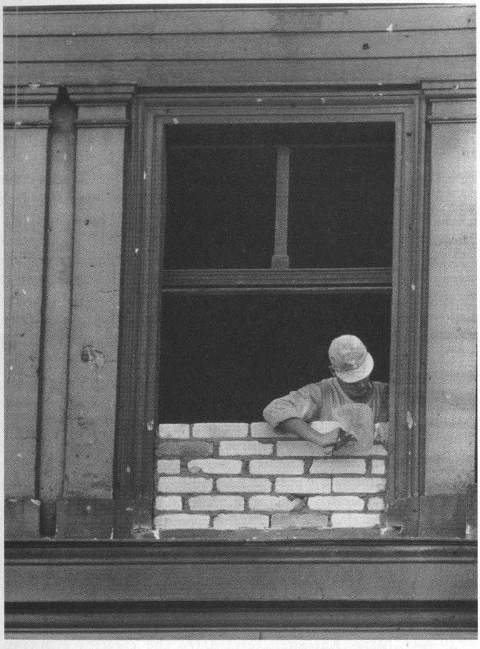 1961. Berlin: All the windows on the Western 􀀣ide of Berlin are bricked up. "As for the wall that separates men, Jean Monnet had measured its thickness and its resistance, and having done so he could not rest until he had understood how he could open a breach into it."