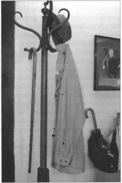 Monnet's hat, walking stick and trenchcoat as they remain in his house of Houjarray.